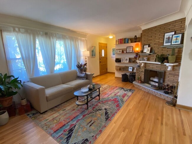 Building Photo - Charming NE Home w/ Two Car Garage