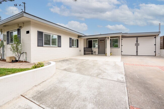 Building Photo - Enjoy stunning sunsets and beach living at its finest, Short Walk to Beach