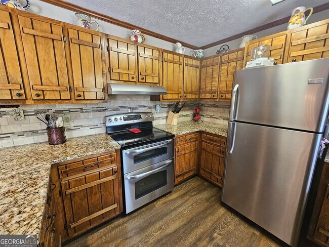 Building Photo - 6090 Strickland Town Rd