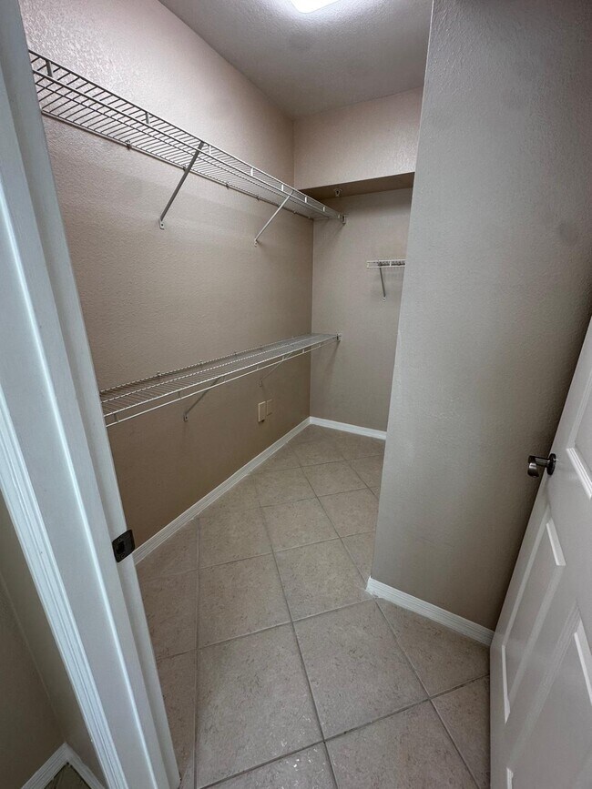 Building Photo - 6511 Emerald Dunes Dr