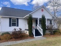Building Photo - Four Bedroom Two Bath House