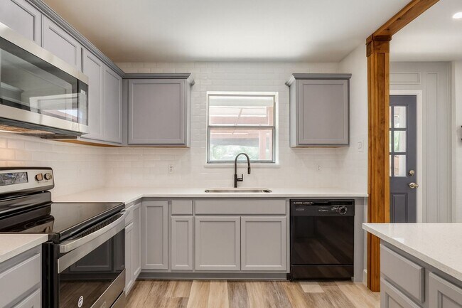 Building Photo - Shaded Wylie Charmer with Fireplace & Covered Patio Comfortable 3-Bed Living