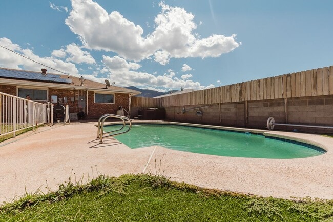 Building Photo - Spacious 3 Bedroom Home with Solar Panels and a Pool