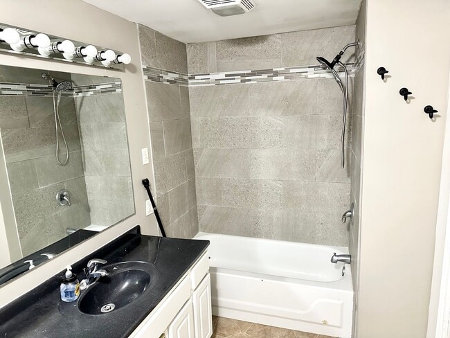 Building Photo - Renovated 3-Bedroom Home Steps from the 12...
