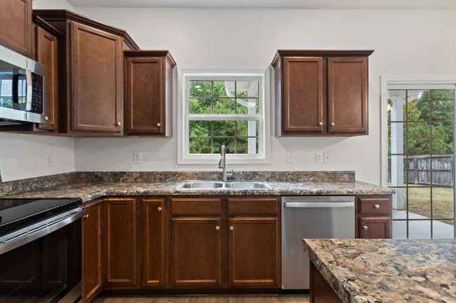 Building Photo - Spacious 4-Bedroom Gem with 2.5 Baths in t...