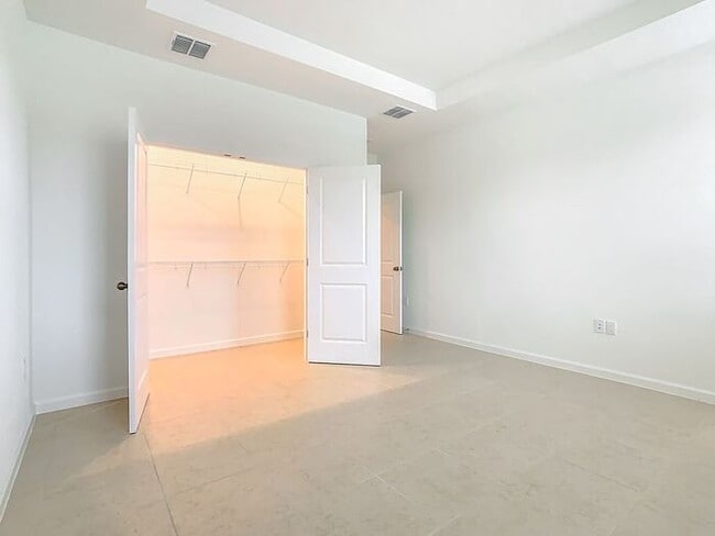 Building Photo - New Luxury Townhome in Celebration, FL Corner unit. All porcelain tiled floors. Aleutian model by...