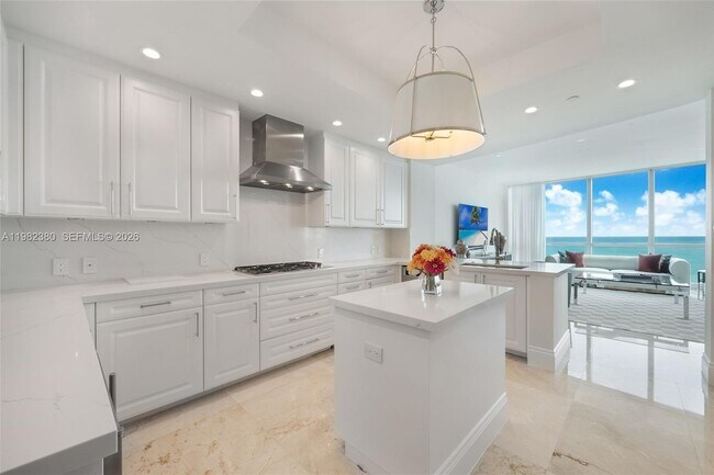 Building Photo - 10295 Collins Ave