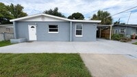 Building Photo - Updated 3 Bedroom Home with Bonus Florida Room, Workshop & Fenced Yard