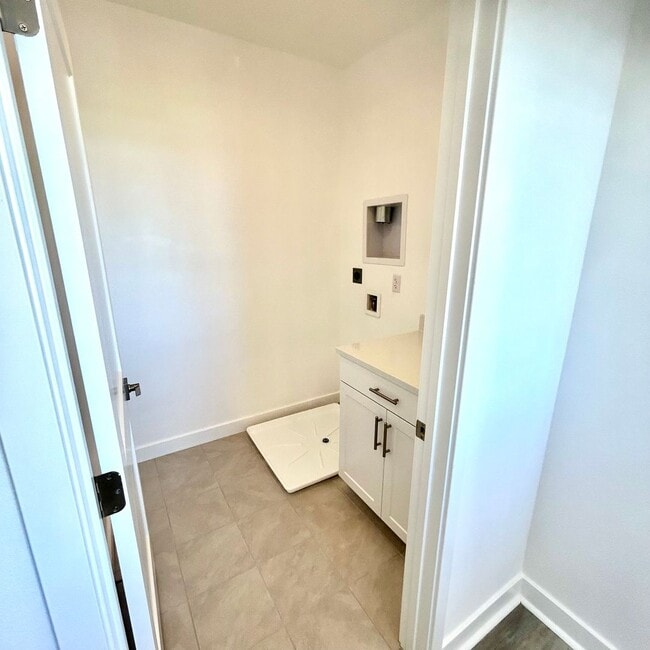 Building Photo - Brand New Townhome with Solar - 2 Bedroom/2.5 Bath