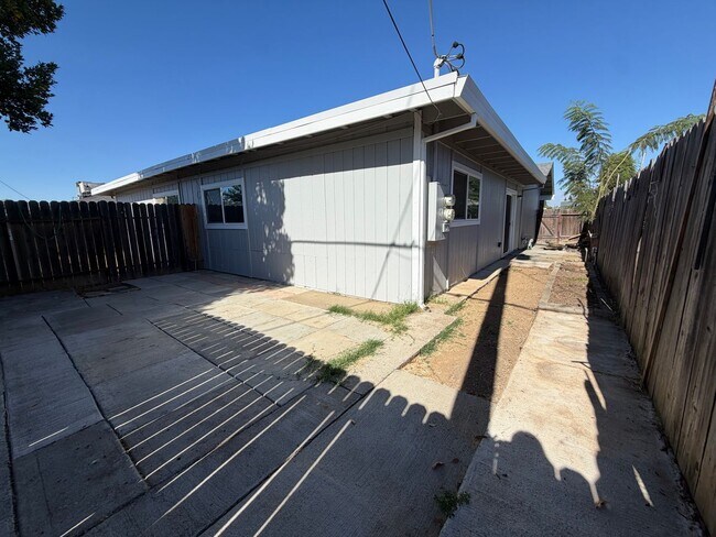 Building Photo - Fully Renovated 2-Bedroom Home with Spacious Backyard – Move-In Ready in Sacramento