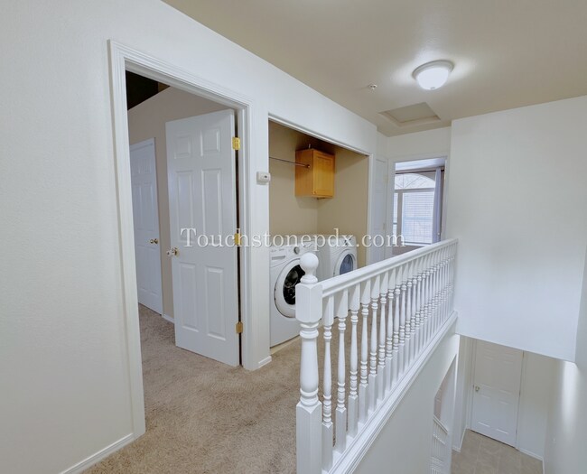 Building Photo - Light Filled 3 Bedroom Townhome with Deck, Attached Garage, and AC