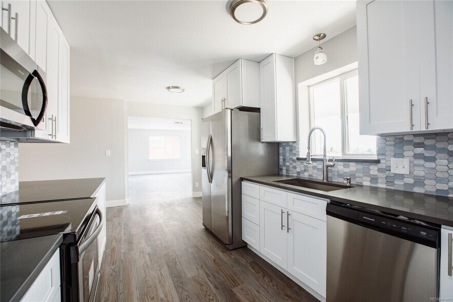 Upstairs Unit Kitchen - 165 W Midway Blvd
