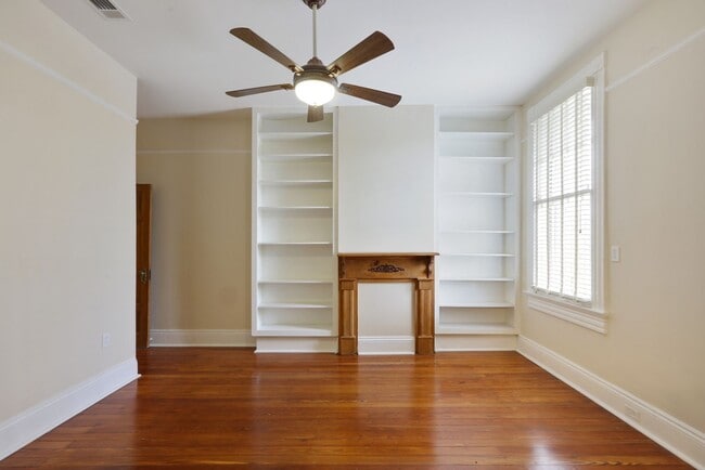 Building Photo - Fabulous University Duplex with gleaming floors and stained glass.