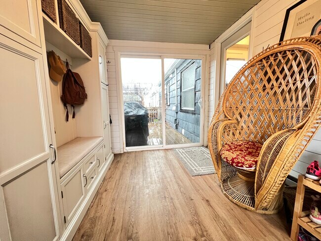 Breezyway connecting house to deck and garage - 3554 Abbott Ave N