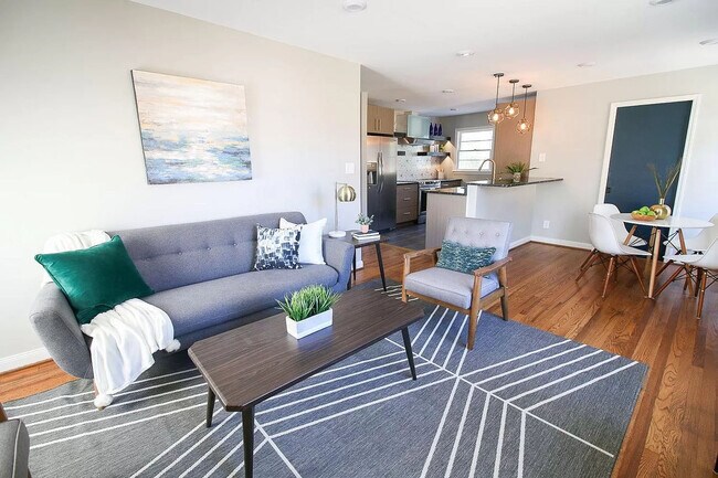 Open concept living room, kitchen, and dining area - 905 Culpepper Ln