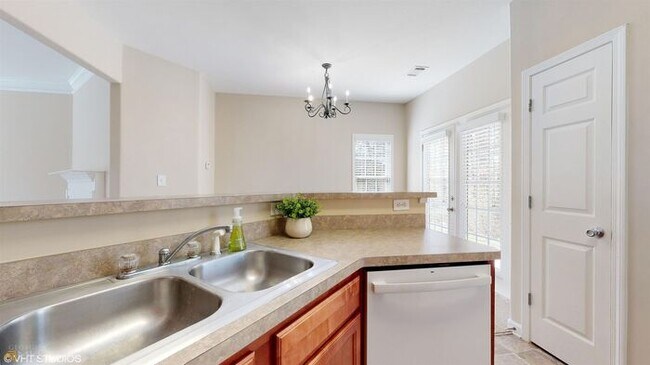 Building Photo - Coming Soon! Exceptional 2BR/2.5BA End Unit Townhome in College Park!