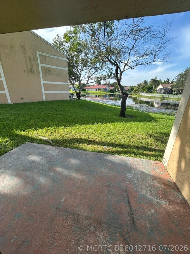 Building Photo - 103 Palm Cir W