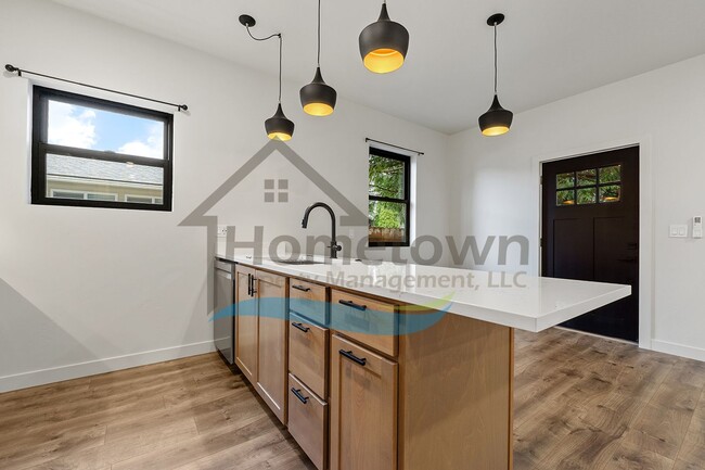 Building Photo - 2025 Home with 3 Bedrooms, 2 Bathrooms, and an Attached 2-Car Garage Available in Sandpoint!