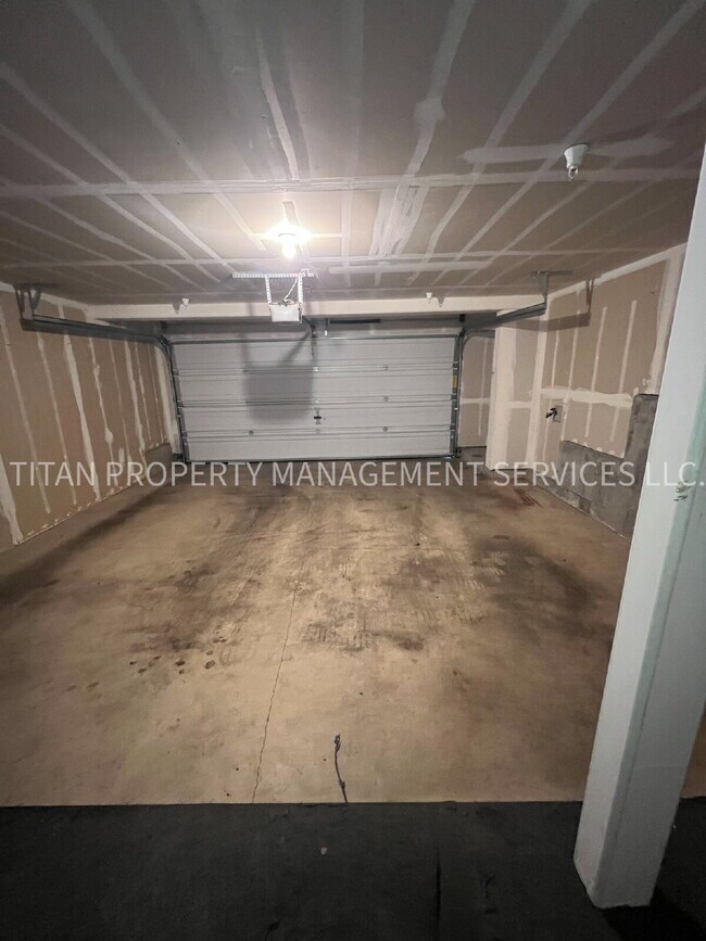 Building Photo - Beautiful Three Story Townhouse with Gas Fireplace, Balcony & 2-Car Garage