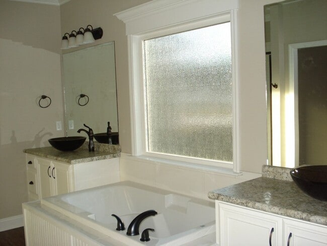 Building Photo - Southern Comfort Living: Elegant 4BR/2BA Home with 3-Car Garage, Close to Moody AFB in Lakeland, GA