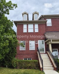 Building Photo - CONVENIENT CONDO LIVING