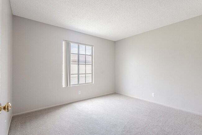 Building Photo - Spacious Single-Story 3-Bedroom Condo with Private Patio and 2-Car Garage