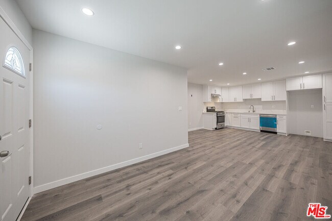 Building Photo - 5837 Cartwright Ave