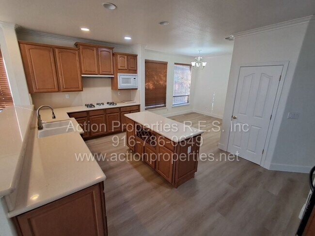 Building Photo - Action Properties R.E.S. Inc. Offering Beautiful Highland Park Single Story 3 Car, 4 Bedroom, Gar...