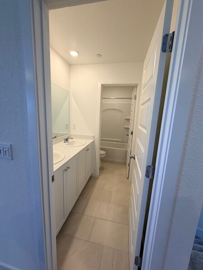 Building Photo - **Welcome to this beautifully designed 4-bedroom, 3-bathroom home offering modern living space.**