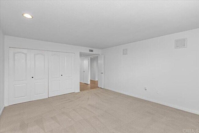 Building Photo - Poolside Living at Its Finest – Turnkey 3BR Condo with Direct Patio Access to the Pool