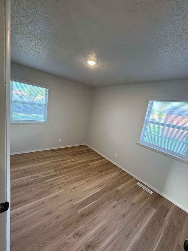 Building Photo - Welcome to Your Next Home with Harvest Management