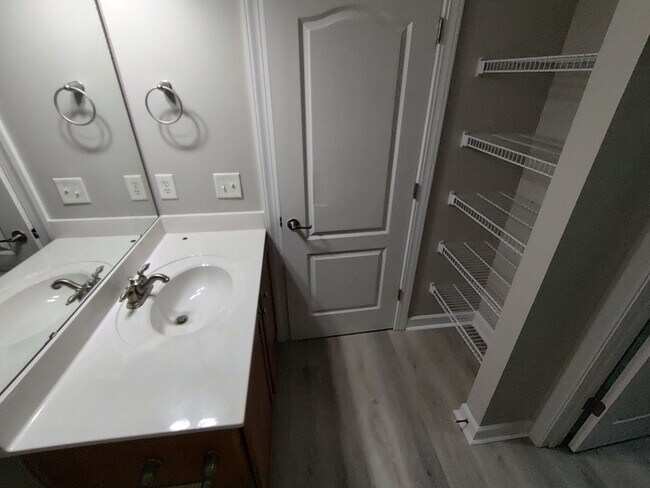 Building Photo - BRAND NEW FLOORING & FRESH PAINT - 3 Bedroom/2.5 Bath Townhome with garage in Wild Wing!