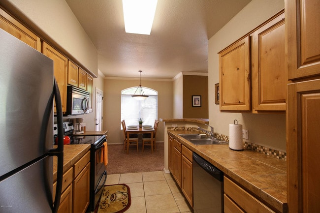 Building Photo - 7050 E Sunrise Dr