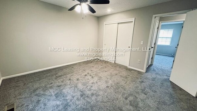 Building Photo - Lee's Summit Townhome w/ Unfinished Baseme...