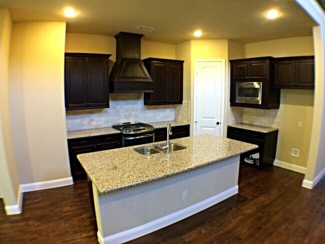 Building Photo - 5 Bdrm/4 Bath / Media Room/ 3300 SF In North Carrollton/Brick And Stone Facade