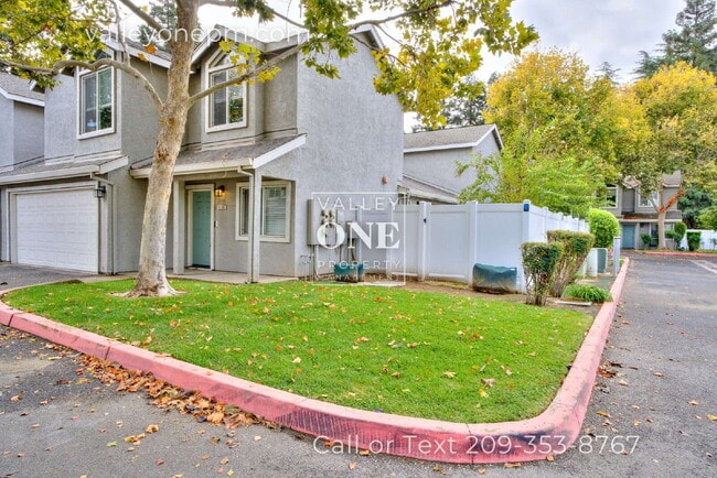 Building Photo - Rare vacancy opportunity in Turlock's finest and most desirable townhome complex!