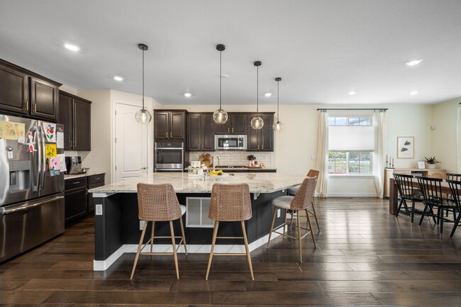 Building Photo - Luxury 4BD, 3.5BA Sterling Ranch Home with...