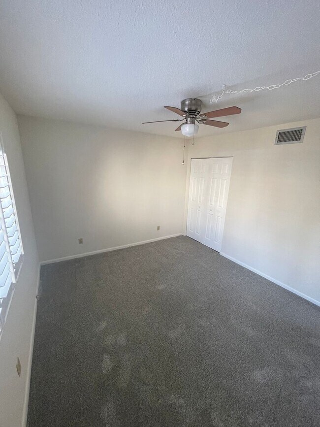 Building Photo - 55+ Charming first-floor condo nestled in the serene Fairways 3 Condominiums