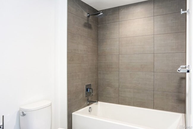 Building Photo - Spacious NW-Facing 1 Bed + Den, 1 Bath Luxury High-Rise Condo in Seattle's Denny Triangle – Nexus