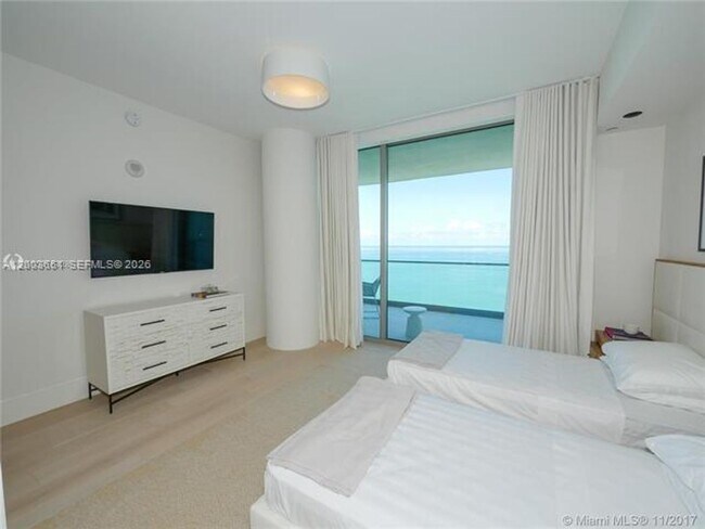 Building Photo - 10201 Collins Ave