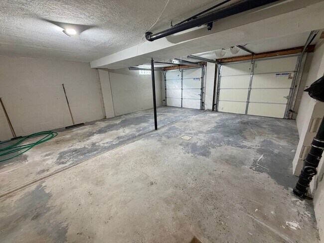 Building Photo - Modern Comforts Await: Spacious Rental with 2-Car Garage, Private Office, and Finished Basement w...