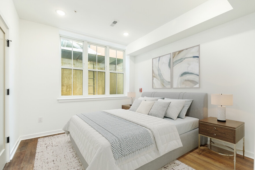 Digitally staged - Bedroom lower level - 608 S American St