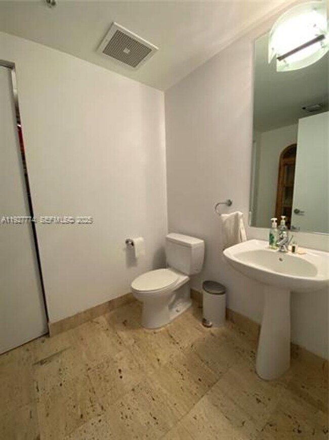 Building Photo - 7901 Hispanola Ave