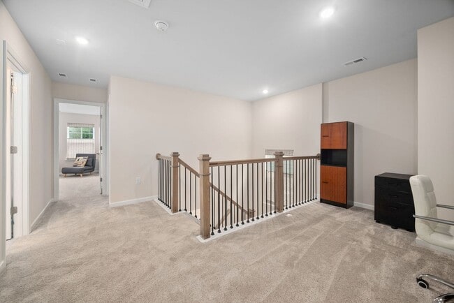 Building Photo - Stunning 3BD, 2.5BA End-Unit Fuquay-Varina Townhome with a 2-Car Garage in a Prime Location Near ...