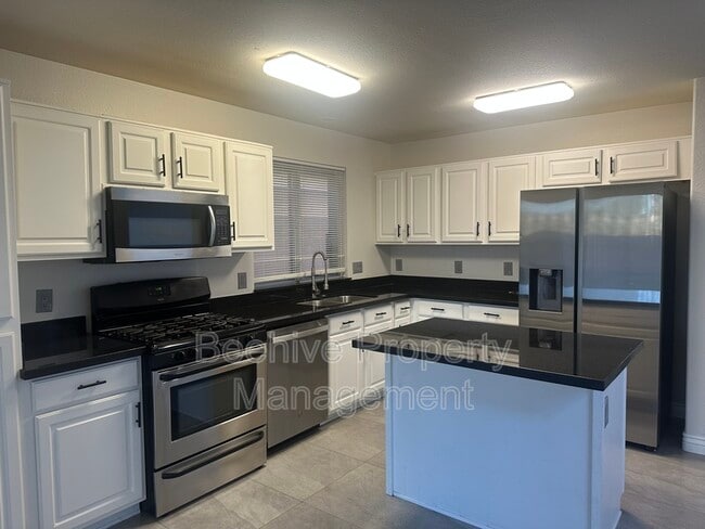 Building Photo - 1034 W Juanita Ave