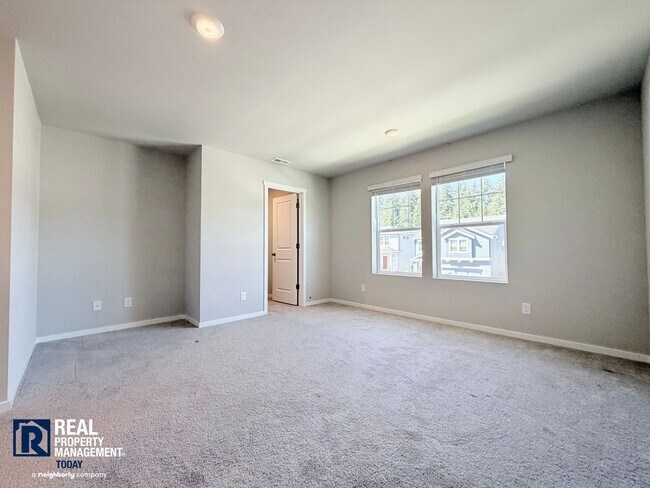 Building Photo - Brand-New 3BR Town Home Near JBLM | Bonus Loft, 2-Car Garage & Modern Finishes