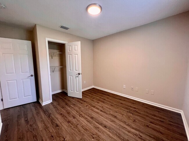 Building Photo - Behind the Gates: A Corner-Lot 4 bedroom, 2 bath Retreat in Coveted Pace Island!!