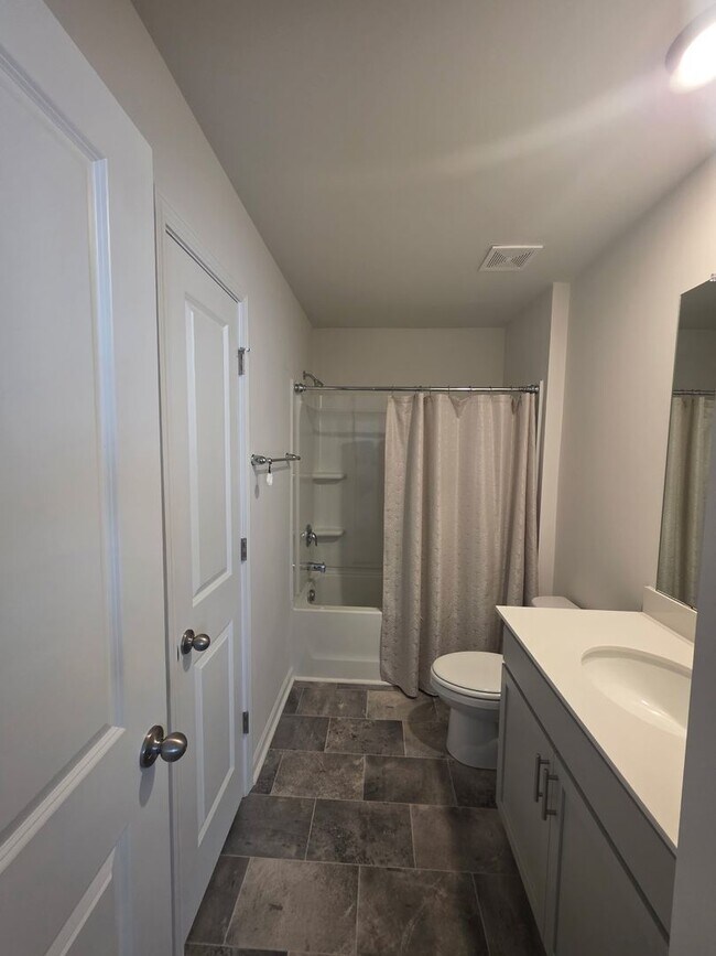 Building Photo - Perfectly Located Townhome