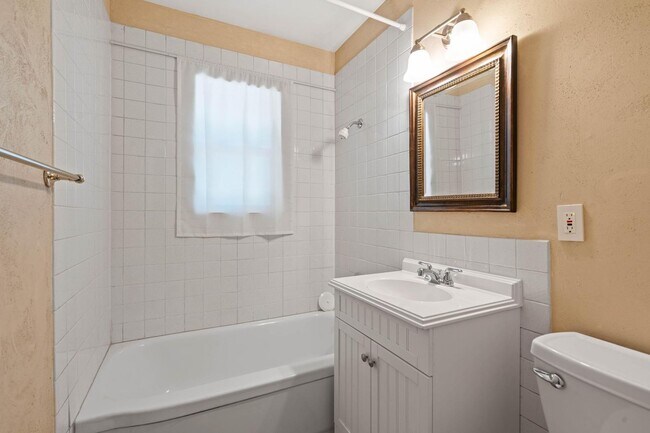 Building Photo - Charming, retro 2-bdrm/2-bath ranch in tranquil setting w/ large family room