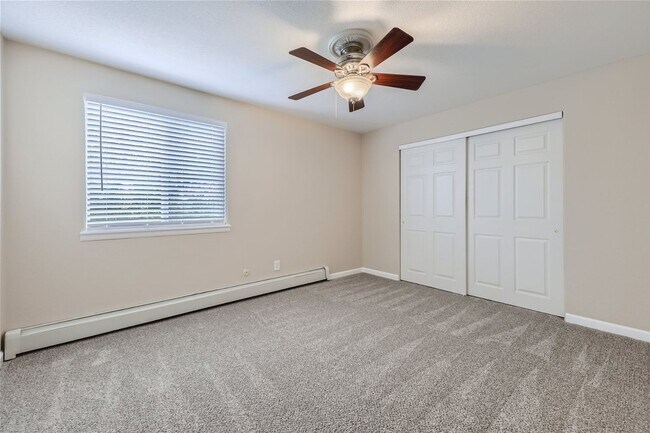 Building Photo - Top-floor, 2-bed 1-bath condo located near the highly desirable Old Town Arvada!